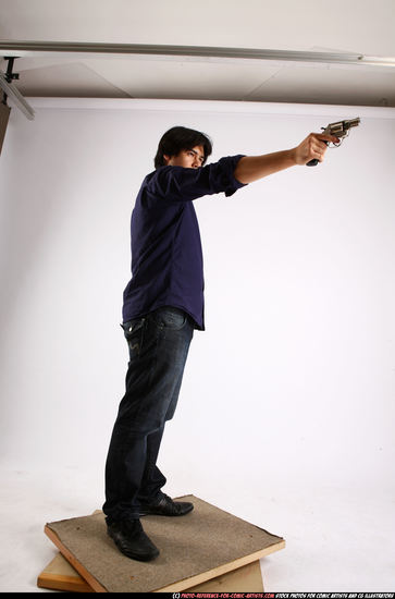 Man Adult Average Fighting with gun Standing poses Casual Asian