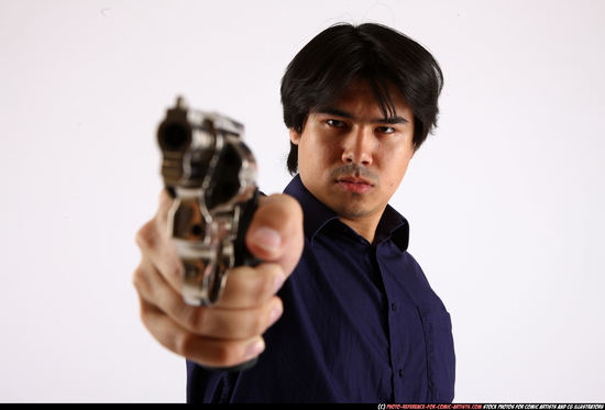 Man Adult Average Fighting with gun Standing poses Casual Asian