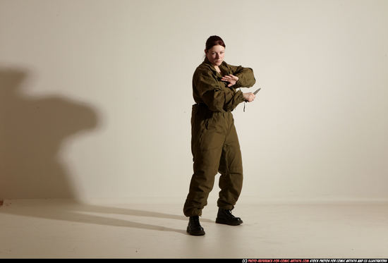 Woman Adult Average White Fighting with knife Moving poses Army