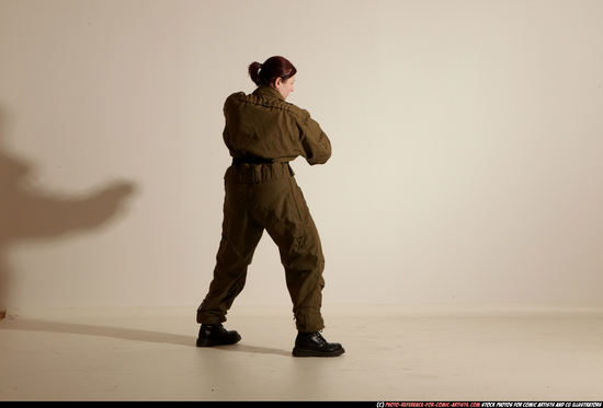 Woman Adult Average White Fighting with knife Moving poses Army