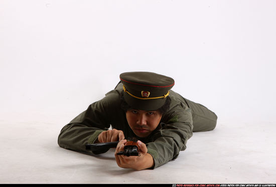 Man Adult Average Fighting with submachine gun Laying poses Army Asian