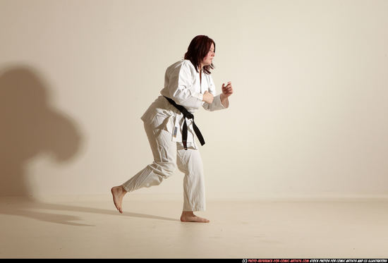 Woman Adult Average White Martial art Moving poses Sportswear