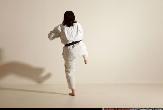 Woman Adult Average White Martial art Moving poses Sportswear