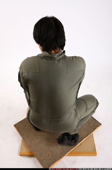 Man Adult Average Fighting with gun Kneeling poses Army Asian