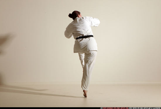 Woman Adult Average White Martial art Moving poses Sportswear