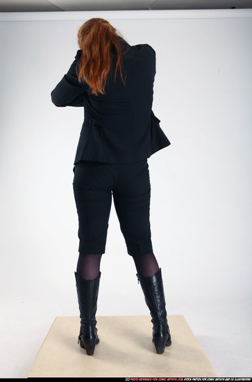 Woman Adult Average White Fighting with gun Standing poses Business