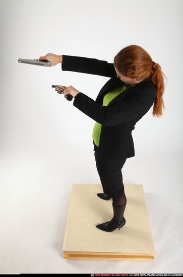 Woman Adult Average White Fighting with gun Standing poses Business