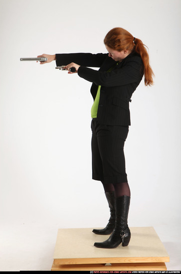 Woman Adult Average White Fighting with gun Standing poses Business