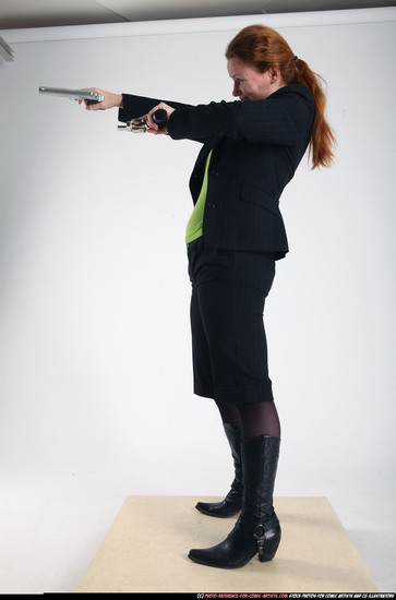 Woman Adult Average White Fighting with gun Standing poses Business