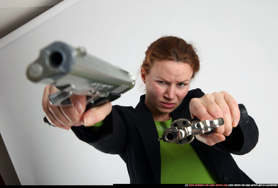 Woman Adult Average White Fighting with gun Standing poses Business