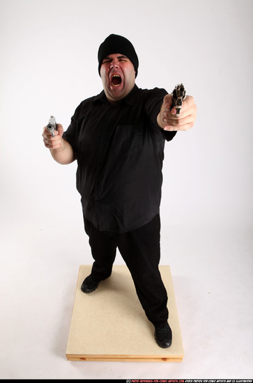 Man Adult Average White Fighting with gun Standing poses Casual