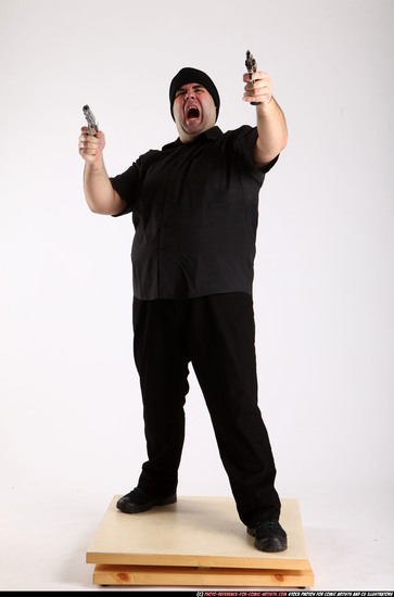 Man Adult Average White Fighting with gun Standing poses Casual