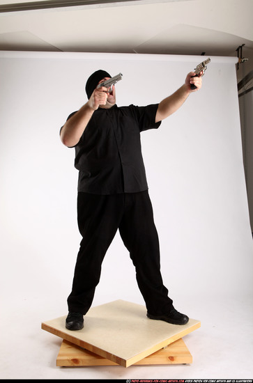 Man Adult Average White Fighting with gun Standing poses Casual