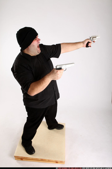 Man Adult Average White Fighting with gun Standing poses Casual