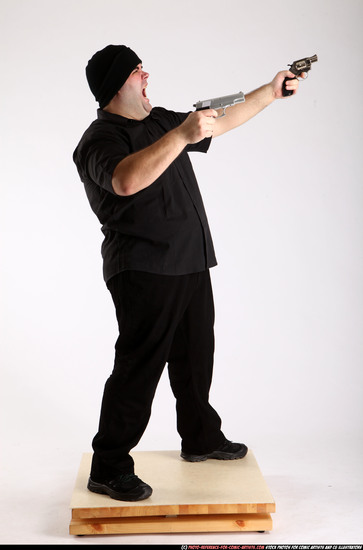 Man Adult Average White Fighting with gun Standing poses Casual