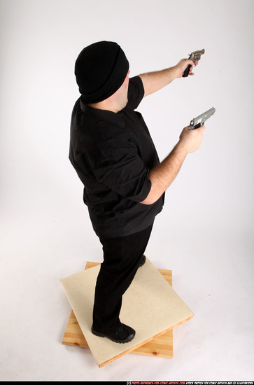 Man Adult Average White Fighting with gun Standing poses Casual