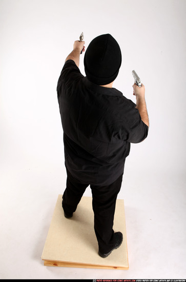 Man Adult Average White Fighting with gun Standing poses Casual