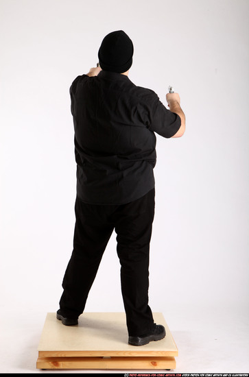 Man Adult Average White Fighting with gun Standing poses Casual