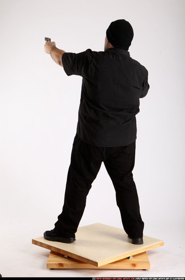 Man Adult Average White Fighting with gun Standing poses Casual