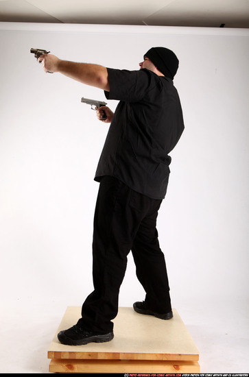 Man Adult Average White Fighting with gun Standing poses Casual