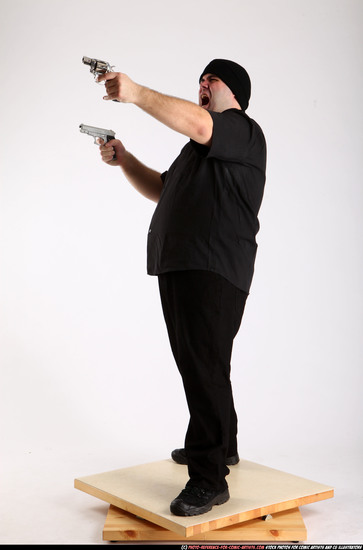 Man Adult Average White Fighting with gun Standing poses Casual