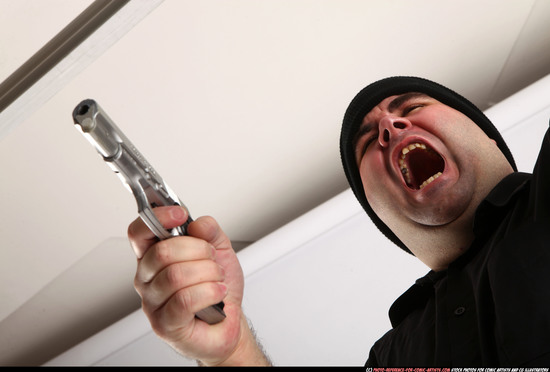 Man Adult Average White Fighting with gun Standing poses Casual