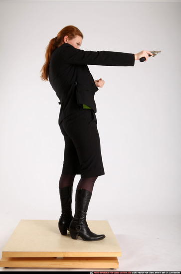 Woman Adult Athletic White Fighting with gun Standing poses Business