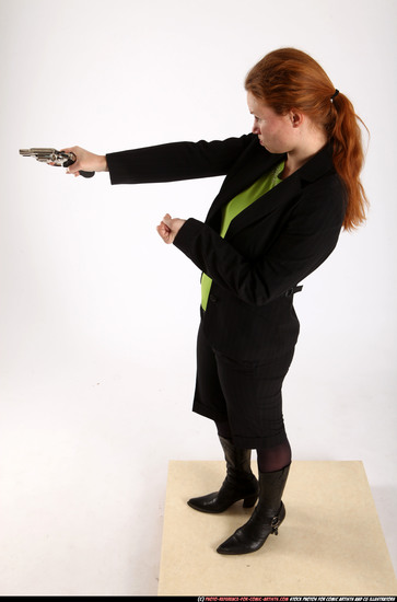 Woman Adult Athletic White Fighting with gun Standing poses Business