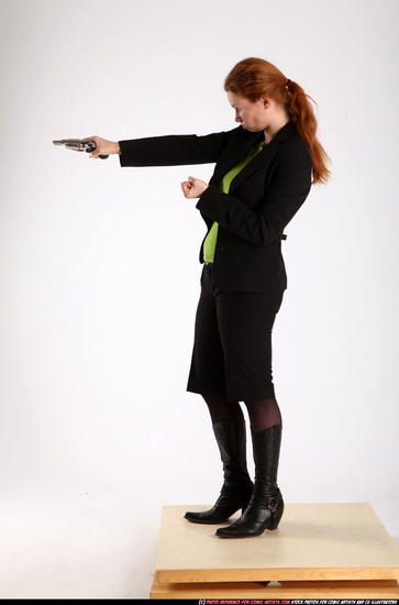 Woman Adult Athletic White Fighting with gun Standing poses Business