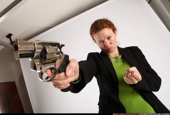 Woman Adult Athletic White Fighting with gun Standing poses Business