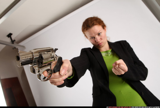 Woman Adult Athletic White Fighting with gun Standing poses Business