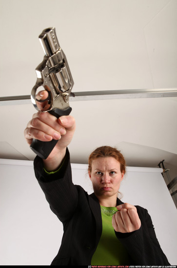 Woman Adult Athletic White Fighting with gun Standing poses Business