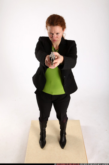 Woman Adult Average White Fighting with gun Standing poses Business