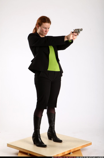 Woman Adult Average White Fighting with gun Standing poses Business