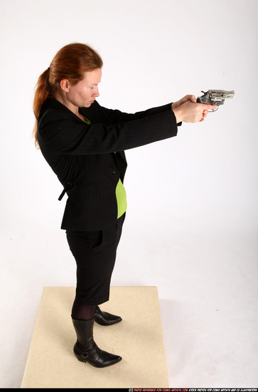 Woman Adult Average White Fighting with gun Standing poses Business