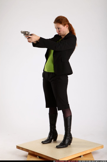 Woman Adult Average White Fighting with gun Standing poses Business