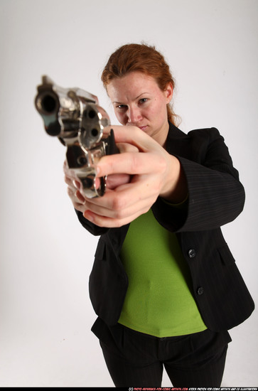 Woman Adult Average White Fighting with gun Standing poses Business