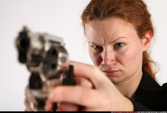 Woman Adult Average White Fighting with gun Standing poses Business