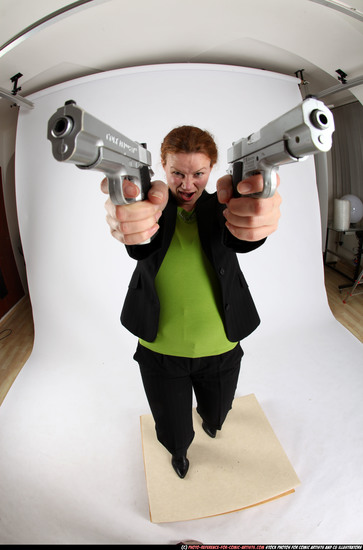 Woman Adult Average White Fighting with gun Standing poses Business