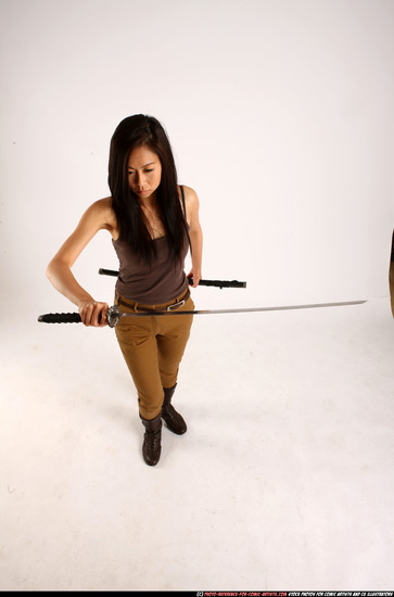 Woman Young Athletic Fighting with sword Standing poses Casual Asian