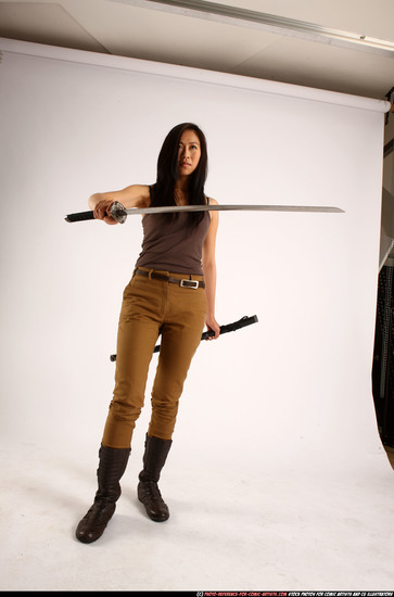 Woman Young Athletic Fighting with sword Standing poses Casual Asian