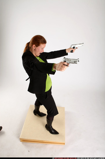 Woman Adult Average White Fighting with gun Standing poses Business