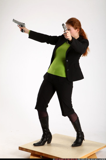 Woman Adult Average White Fighting with gun Standing poses Business