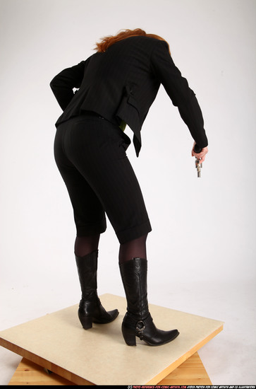 Woman Adult Average White Fighting with gun Standing poses Business