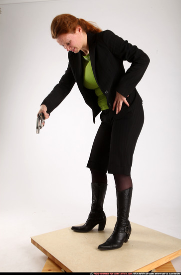 Woman Adult Average White Fighting with gun Standing poses Business