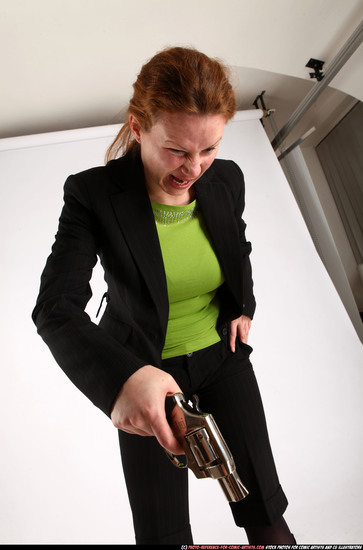 Woman Adult Average White Fighting with gun Standing poses Business