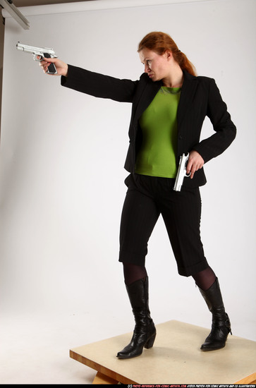 Woman Adult Average White Fighting with gun Standing poses Business