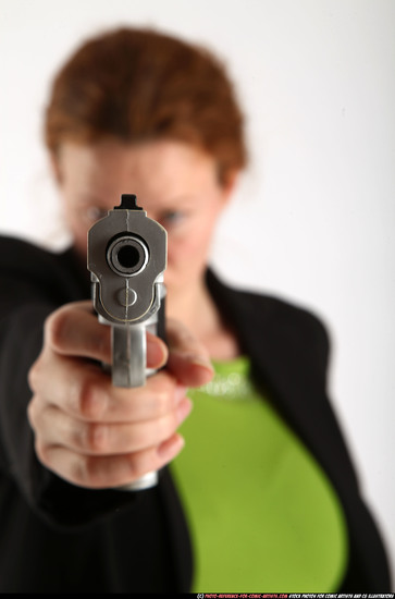 Woman Adult Average White Fighting with gun Standing poses Business