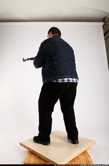 Man Adult Chubby White Fighting with gun Standing poses Casual