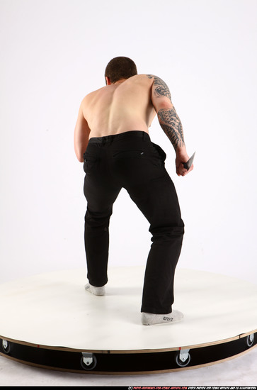 Man Adult Athletic White Fighting with knife Standing poses Pants